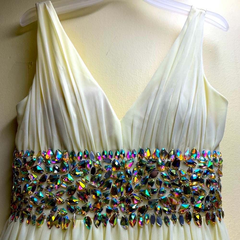 Beautiful JCPenny v-neck pastel yellow chiffon dress with rhinestones.